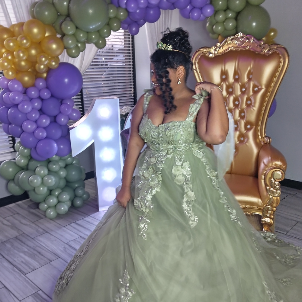 Elegant Green Gown with Floral Details
